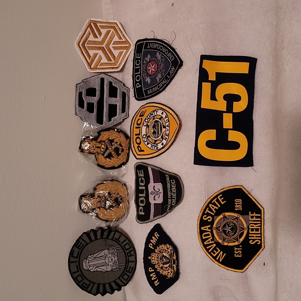 9 fictional patches + 2 gold embroidered  from productions